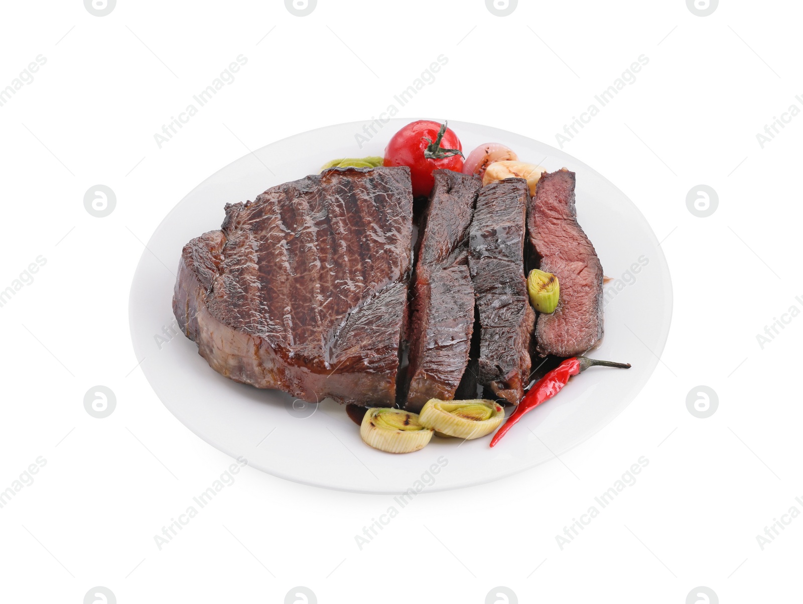 Photo of Delicious grilled beef meat with vegetables isolated on white