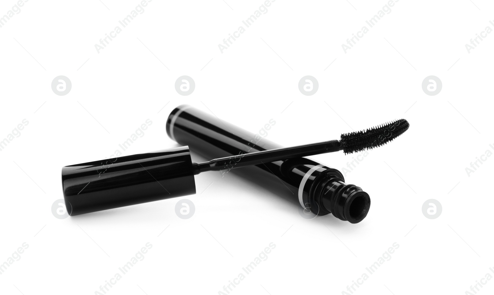 Photo of Mascara for eyelashes on white background. Makeup product