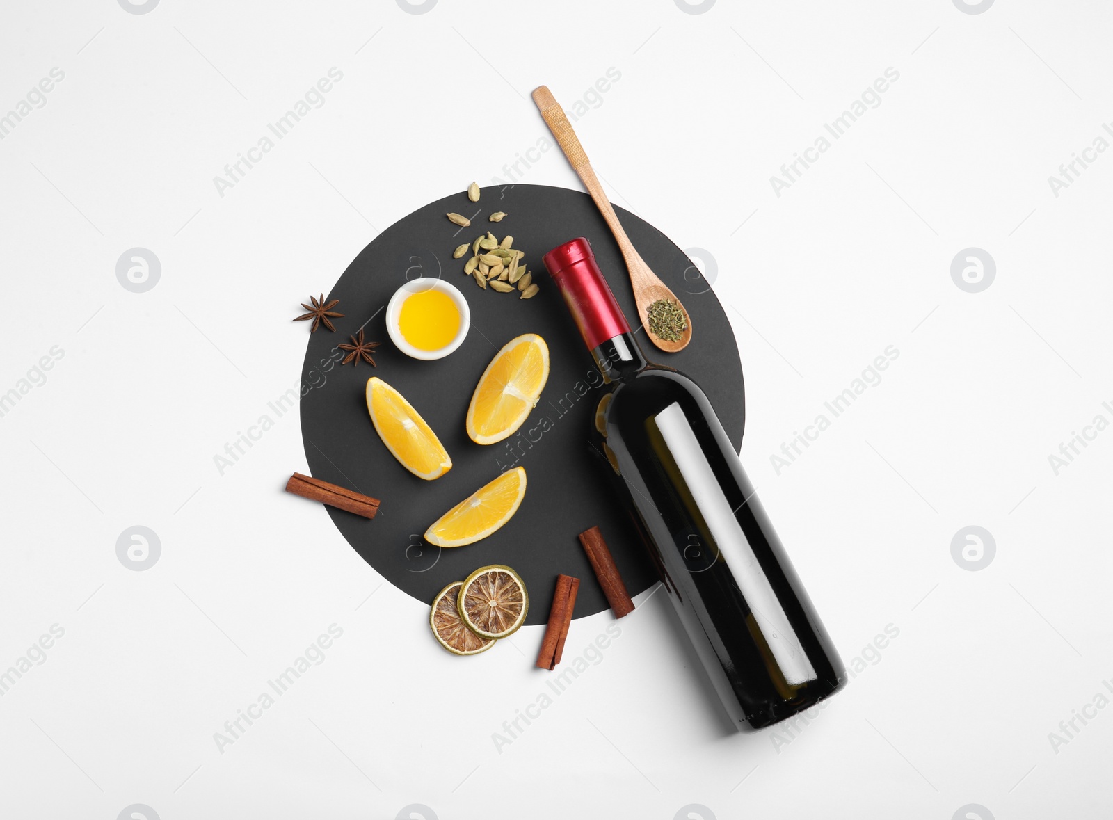 Photo of Composition with ingredients for mulled wine on white background, top view