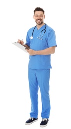 Photo of Full length portrait of smiling male doctor in scrubs with clipboard isolated on white. Medical staff