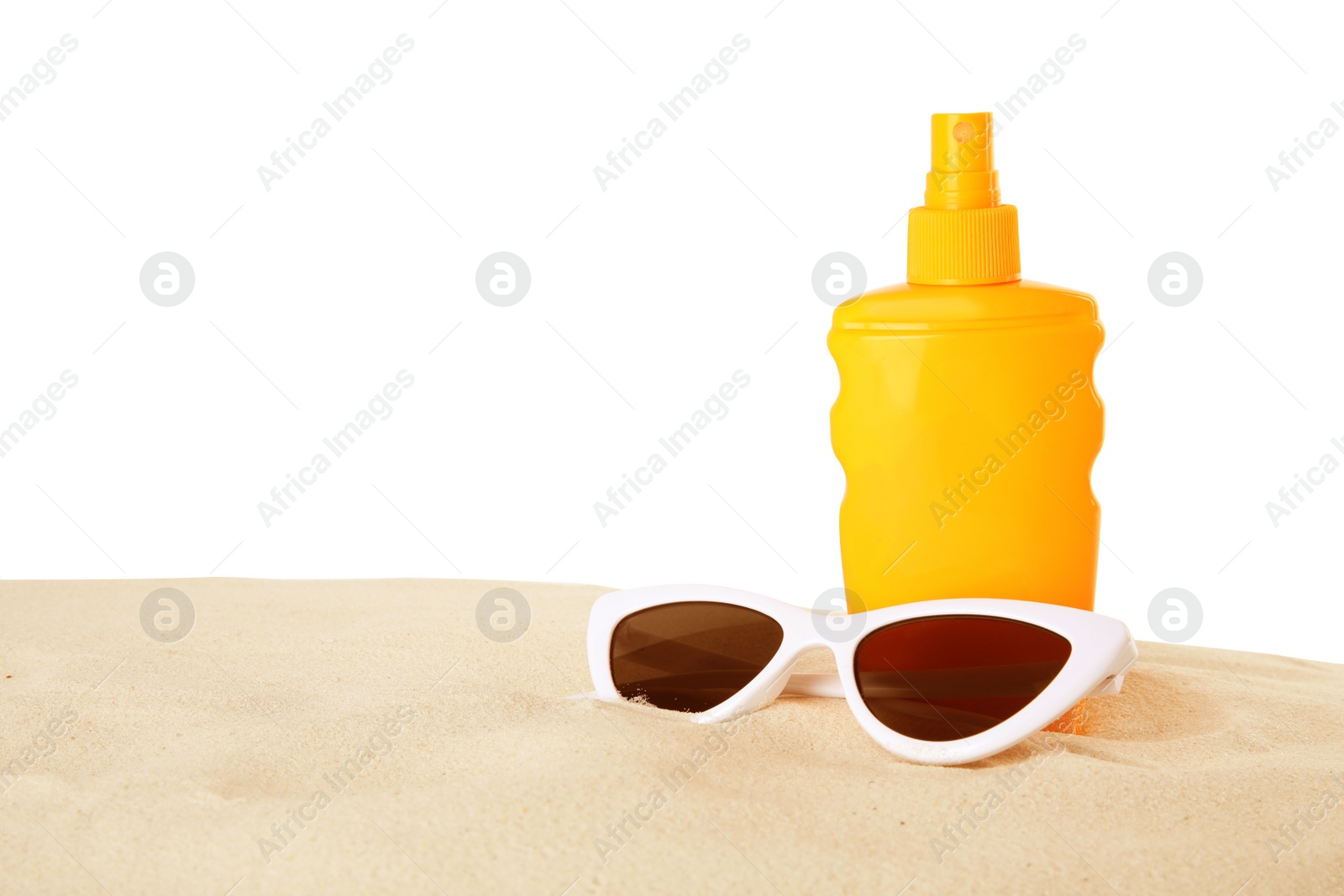 Photo of Bottle of sun protection body cream and glasses on white background