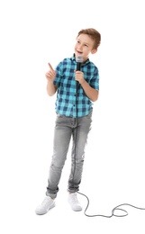 Photo of Cute boy singing in microphone on white background