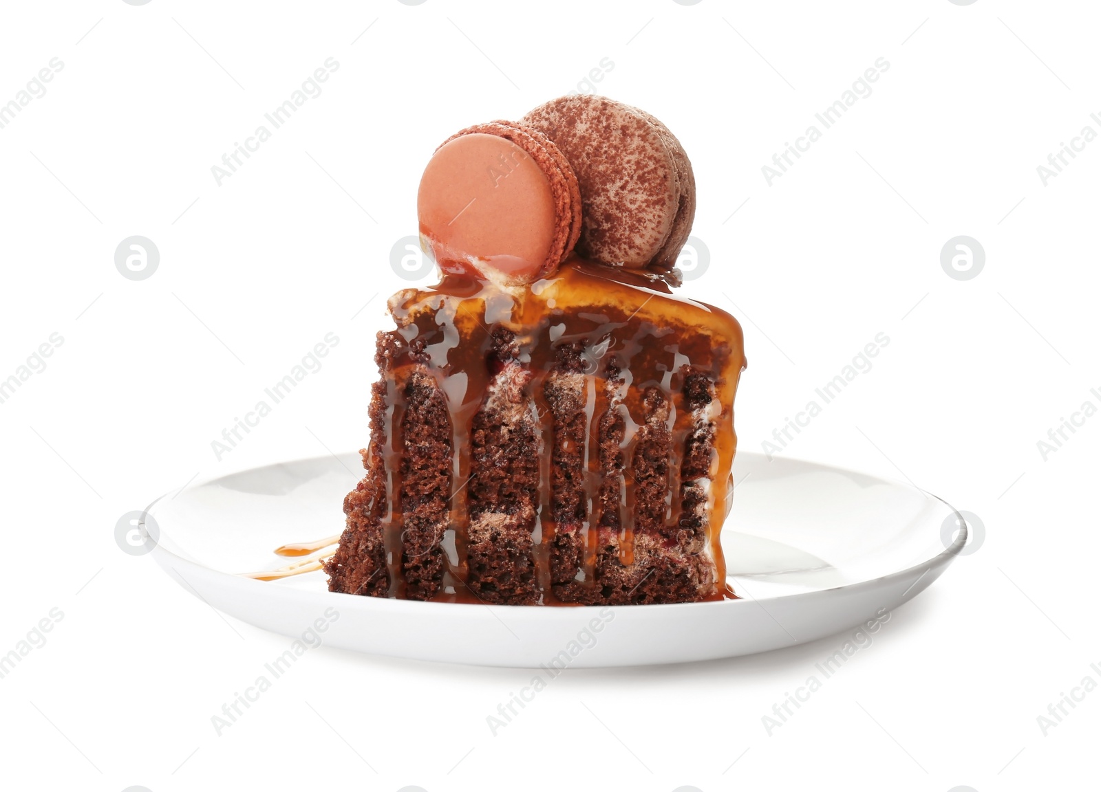 Photo of Piece of delicious homemade cake with caramel sauce white background