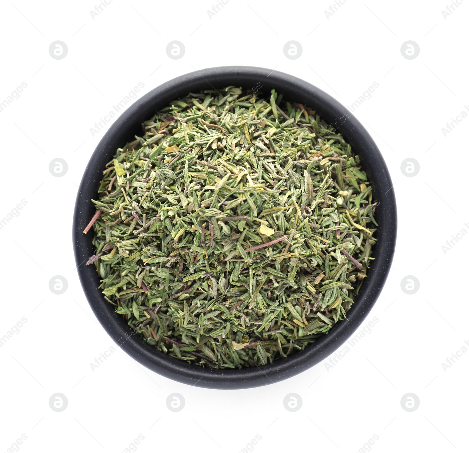 Photo of Bowl of dried thyme isolated on white, top view