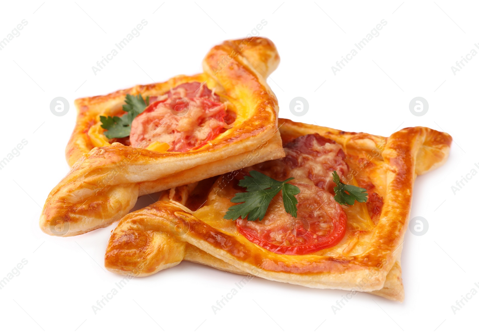 Photo of Fresh delicious puff pastry with cheese, tomatoes and parsley on white background, closeup