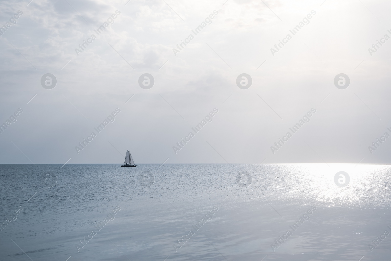 Photo of Beautiful view of sailing boat in sea on sunny day
