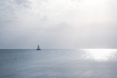 Beautiful view of sailing boat in sea on sunny day