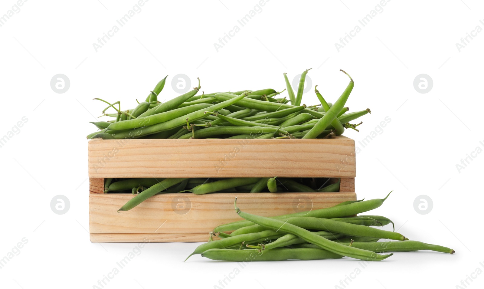 Photo of Fresh green beans in wooden crate on white background