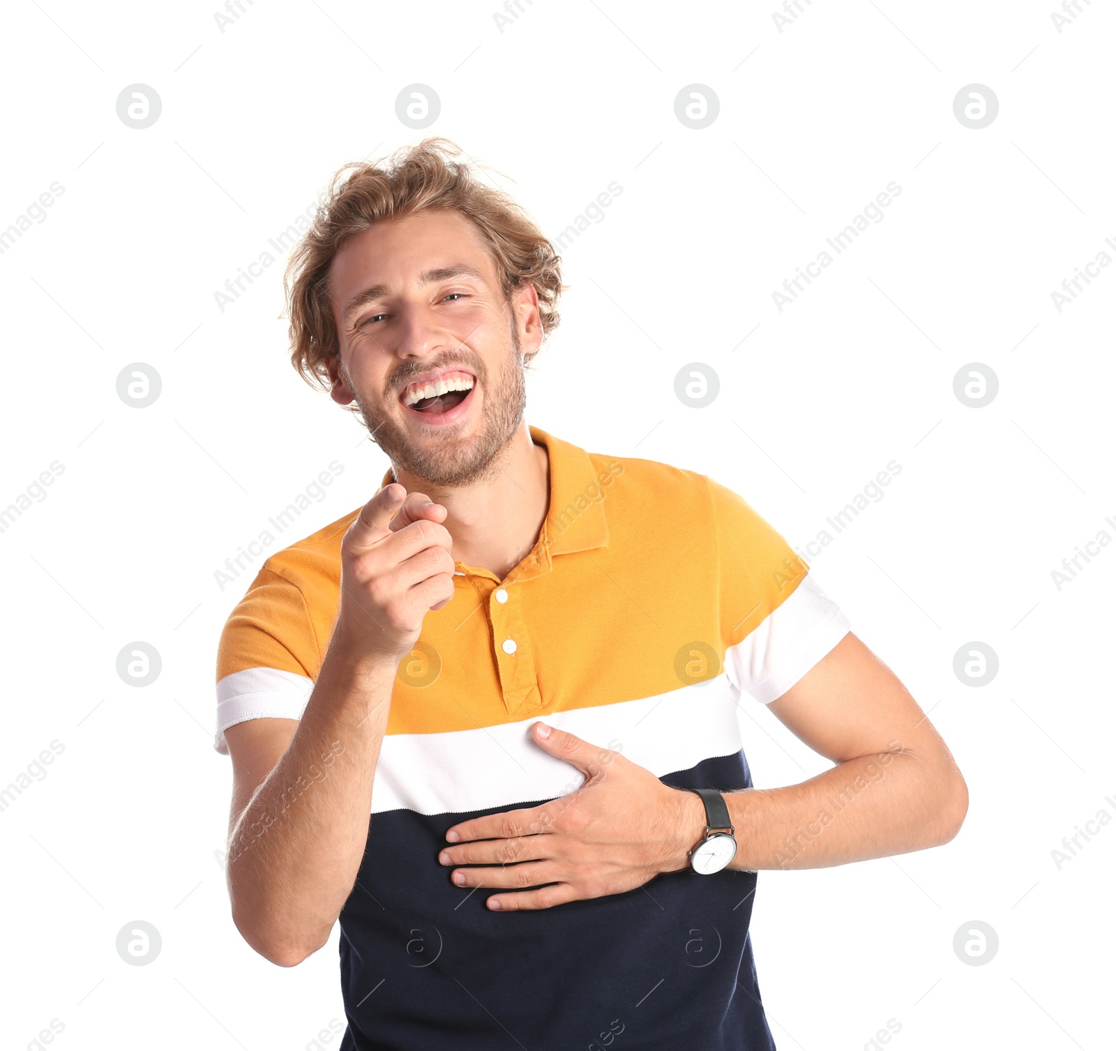 Photo of Handsome young man laughing on white background