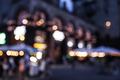 Blurred view of modern city at evening. Bokeh effect