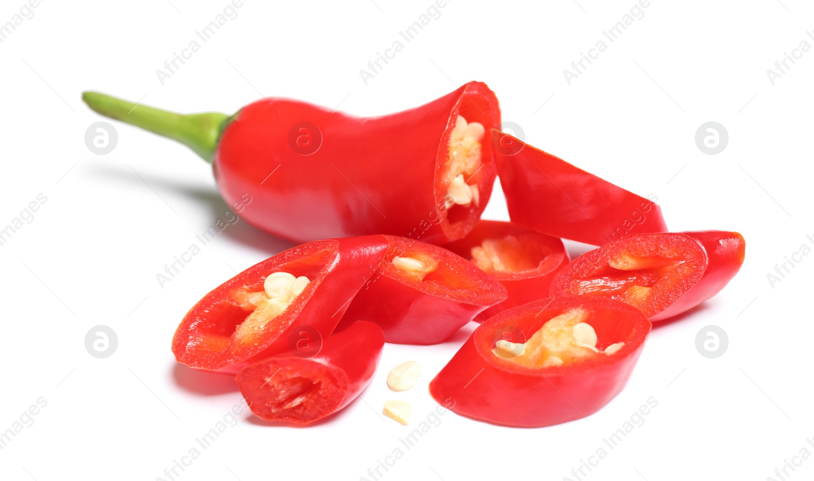 Photo of Cut red hot chili pepper on white background