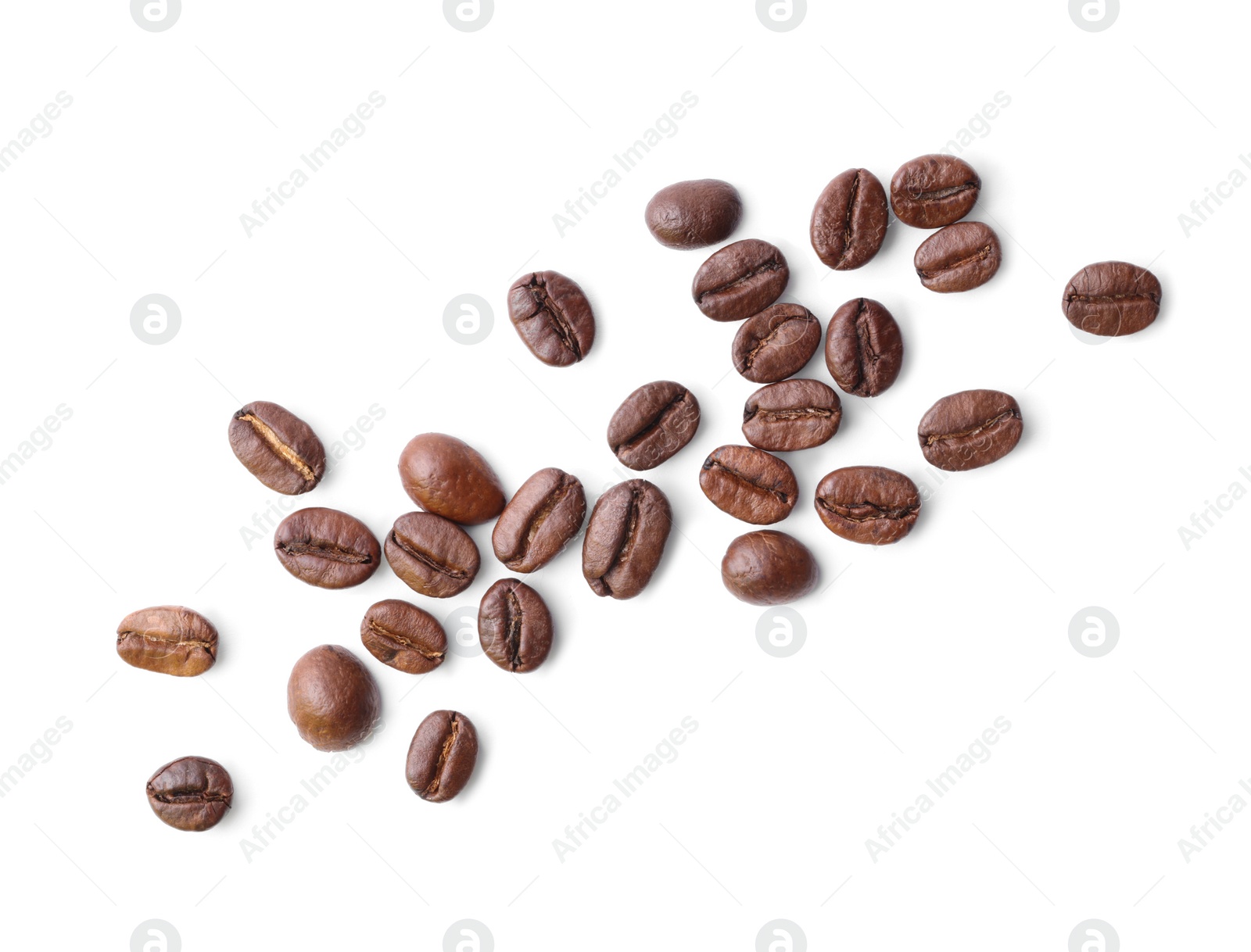 Photo of Many roasted coffee beans isolated on white, top view