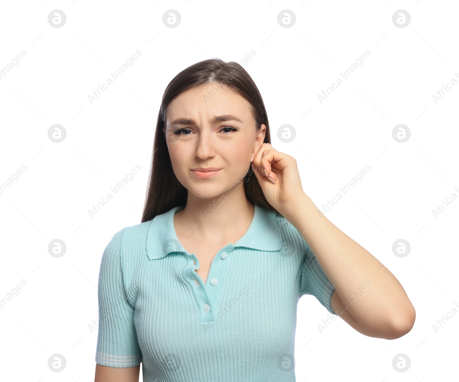 Photo of Young woman suffering from ear pain on white background