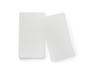 Photo of Blank business cards isolated on white, top view. Mockup for design