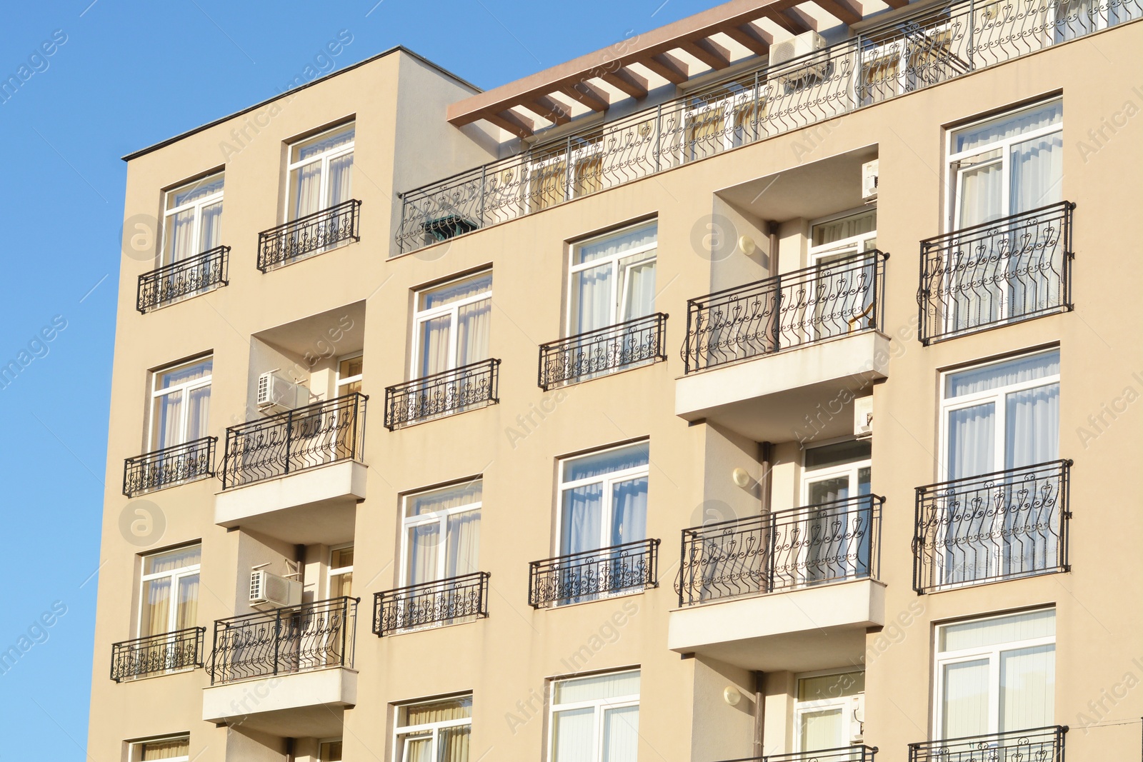 Photo of Exterior of beautiful residential building with balconies