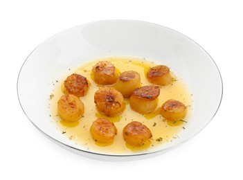 Delicious fried scallops with sauce isolated on white