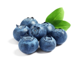 Fresh raw tasty blueberries with leaves isolated on white