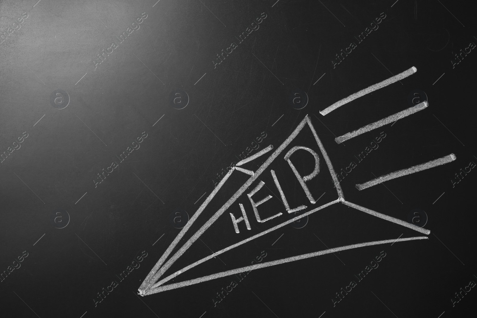 Photo of Drawing of paper plane and word "Help" on chalkboard. Space for text