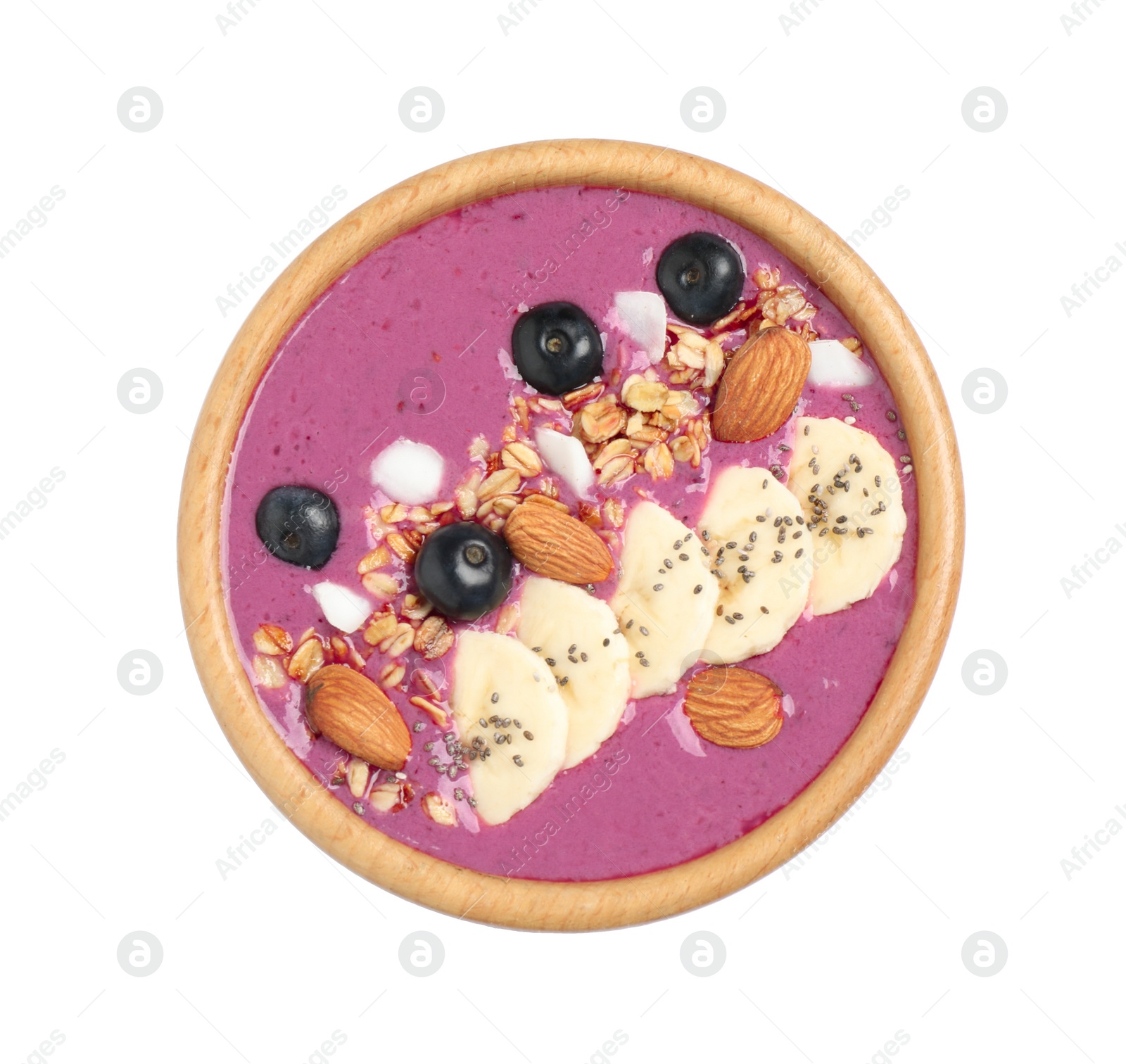 Photo of Delicious acai smoothie with granola and almonds in dessert bowl isolated on white, top view