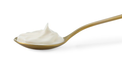 Photo of One golden spoon with mayonnaise isolated on white