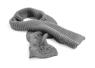 Photo of One grey knitted scarf on white background