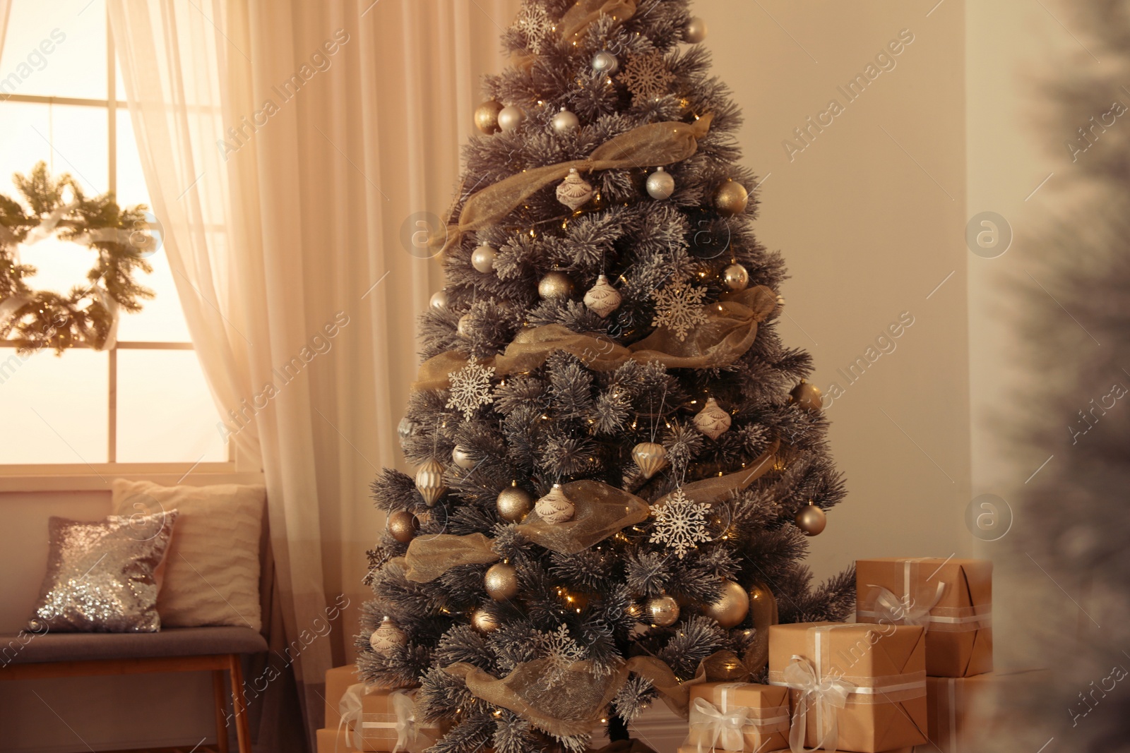 Photo of Beautiful interior of living room with decorated Christmas tree