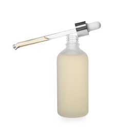 Photo of Bottle of hydrophilic oil and pipette on white background