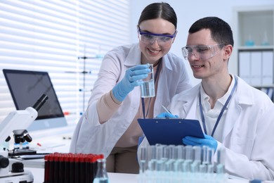 Photo of Scientists working with samples in laboratory. Medical research