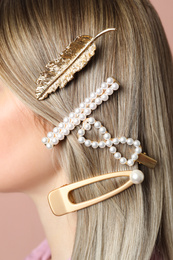 Woman with beautiful different hair clips, closeup