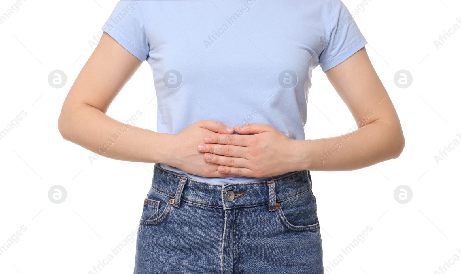 Photo of Woman suffering from abdominal pain on white background, closeup. Unhealthy stomach