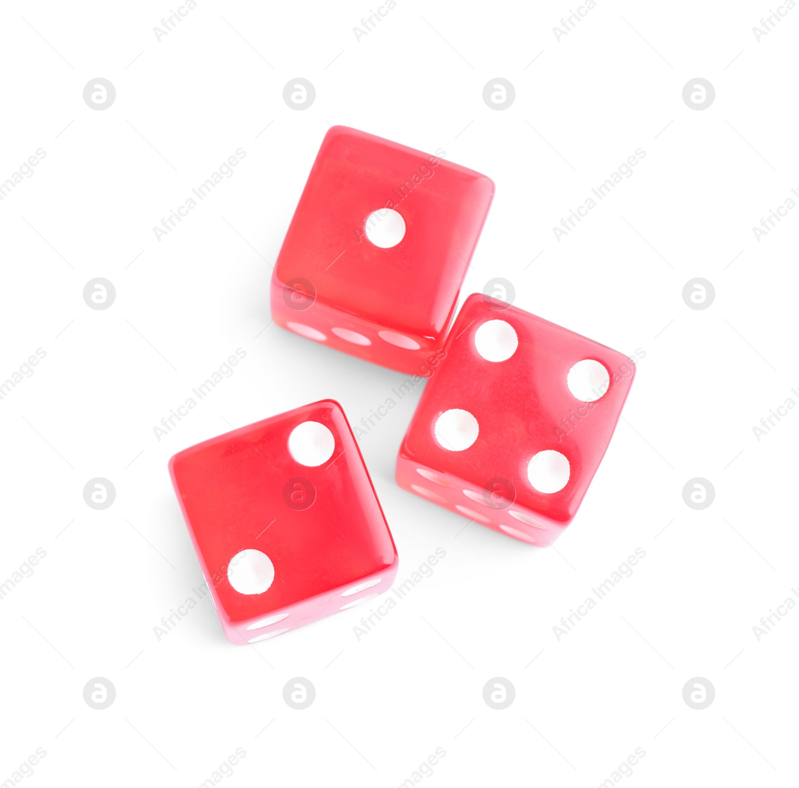 Photo of Three red game dices isolated on white, top view