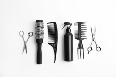 Photo of Professional hairdresser tools on white background