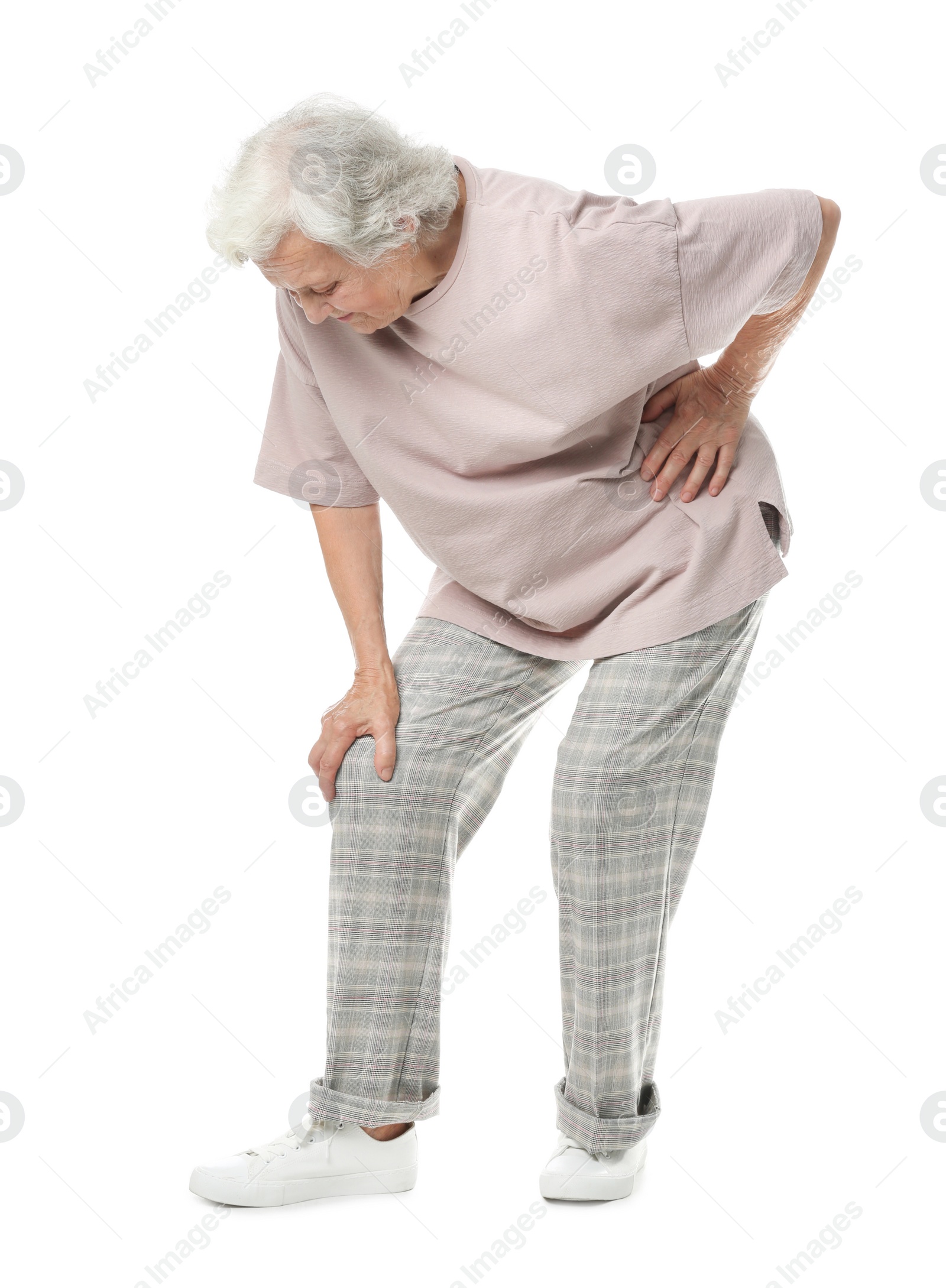 Photo of Full length portrait of senior woman having knee problems on white background