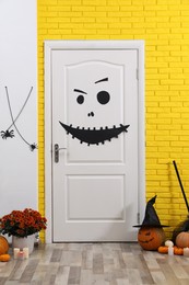 Stylish hallway interior with different Halloween decor