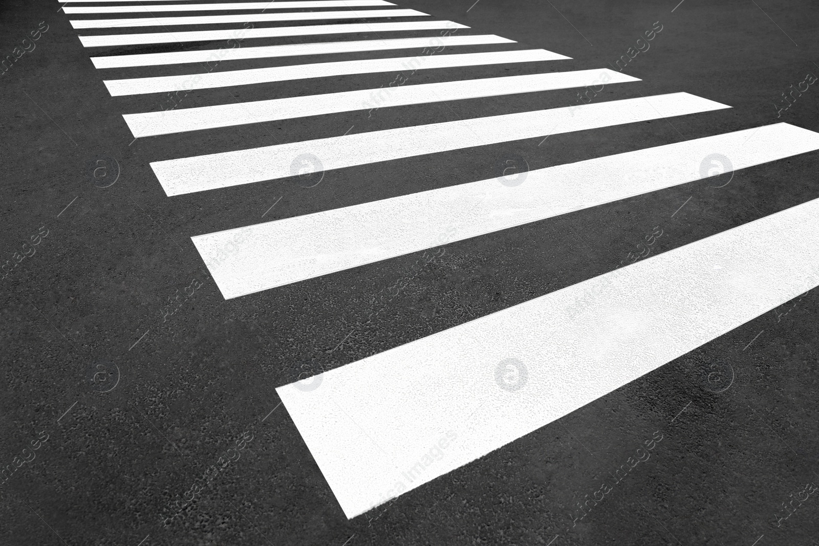 Photo of Pedestrian crossing on empty city street, closeup