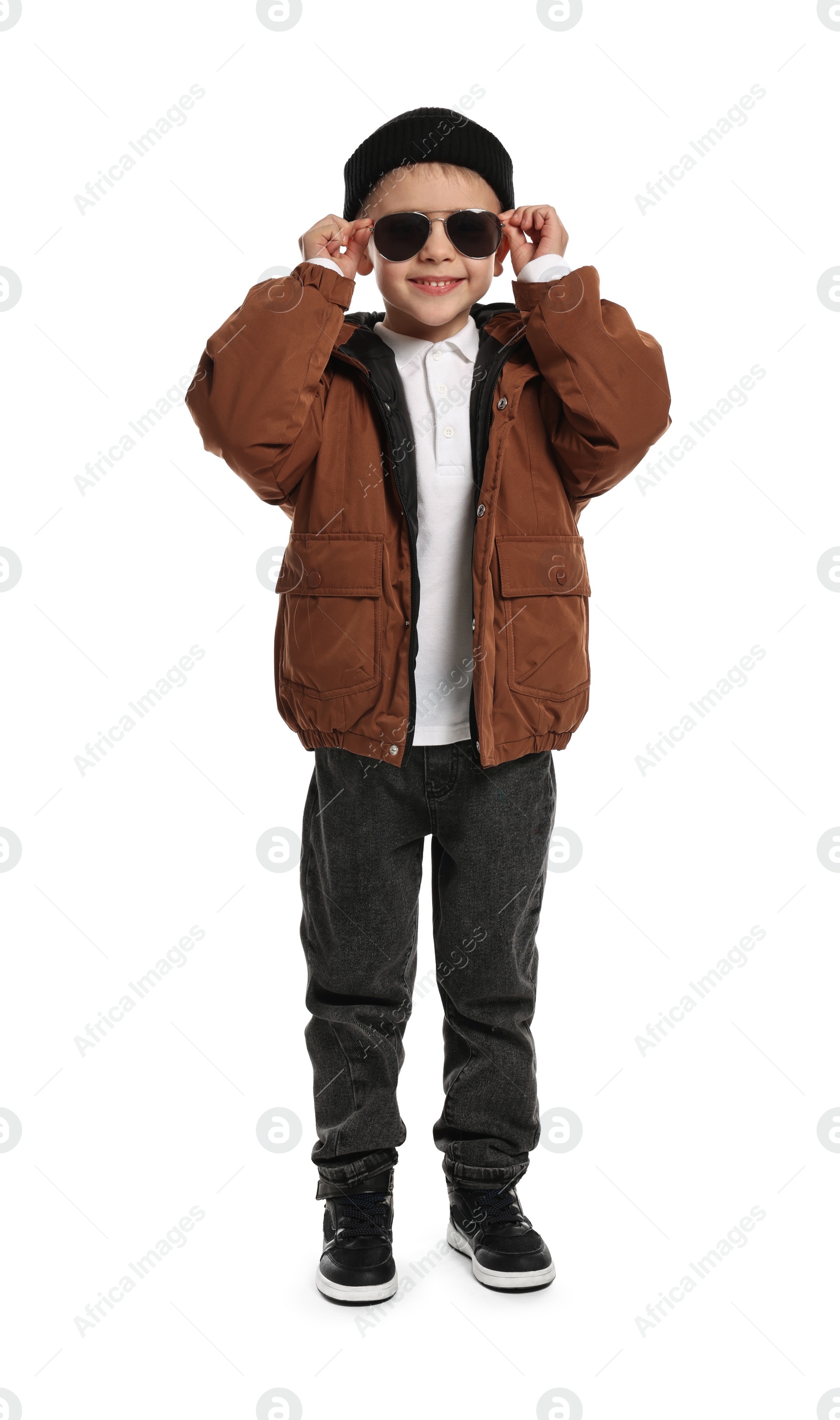 Photo of Fashion concept. Stylish boy with sunglasses on white background