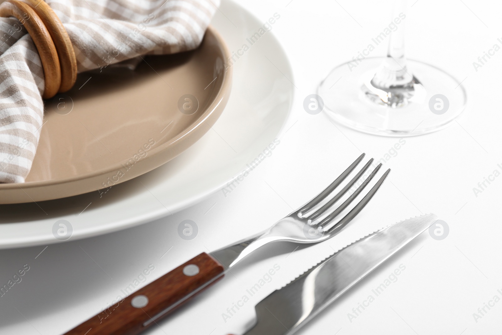 Photo of Elegant table setting on white background, closeup