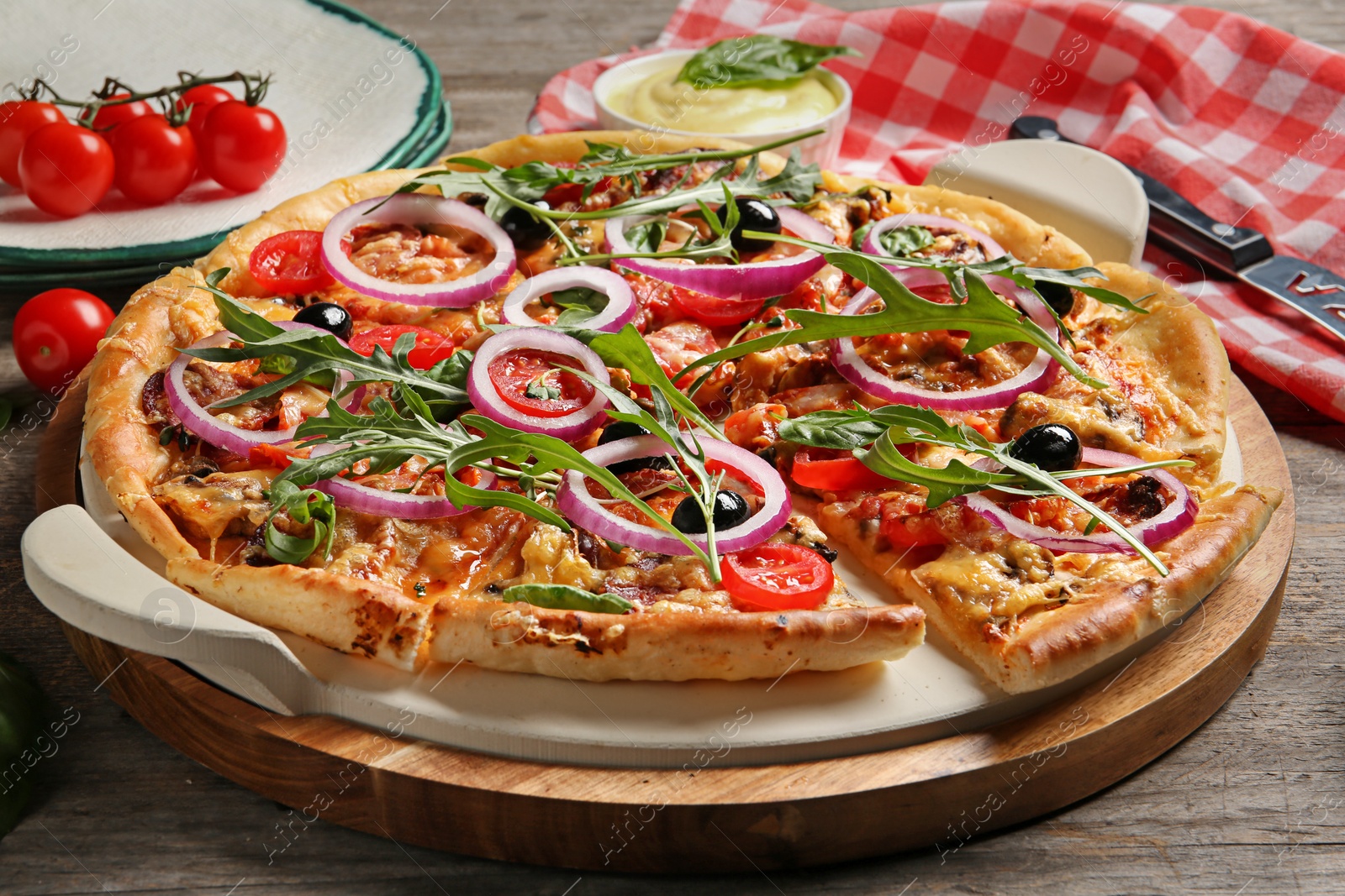 Photo of Tasty fresh homemade pizza on wooden table