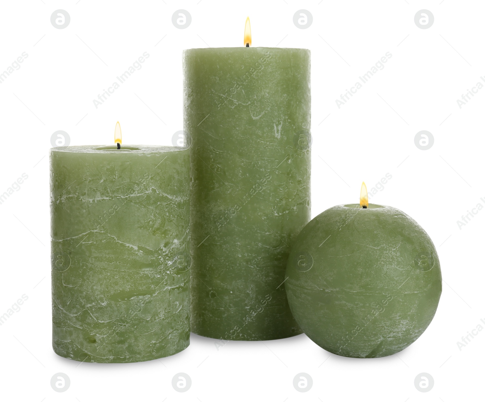 Photo of New wax candles on white background. Interior elements