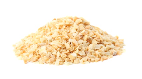 Photo of Pile of granulated dry garlic on white background