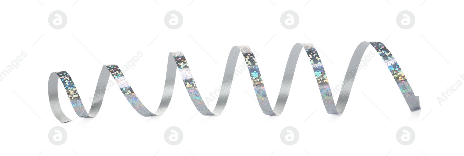 Photo of Shiny silver serpentine streamer on white background