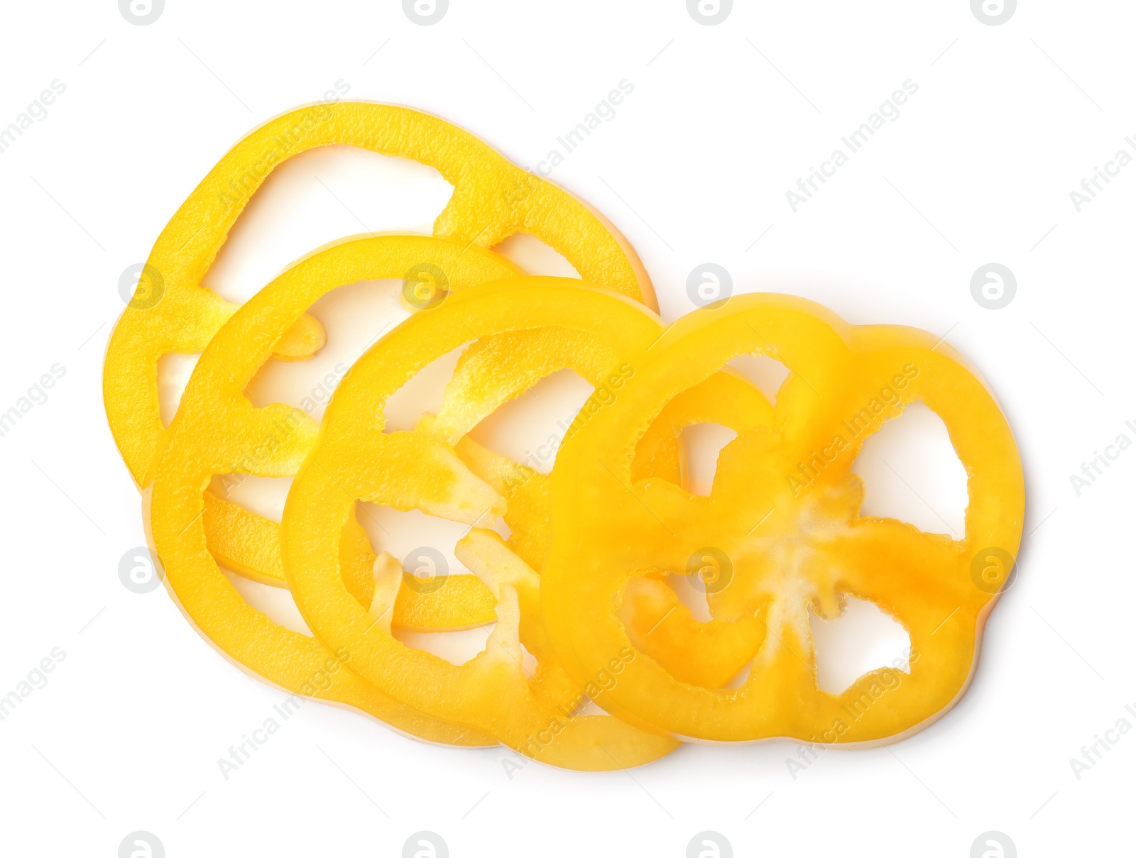 Photo of Slices of yellow bell pepper on white background, top view