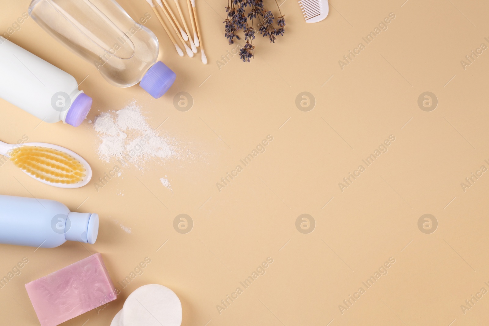 Photo of Flat lay composition with baby care products and accessories on beige background. Space for text