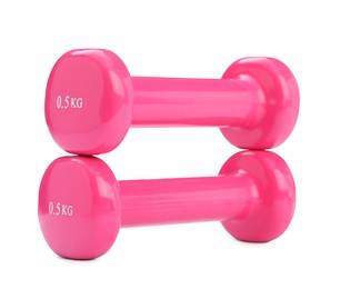 Pink dumbbells isolated on white. Sports equipment