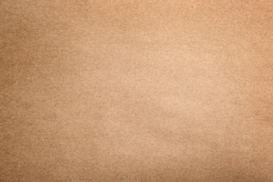 Photo of Sheet of kraft paper as background, top view. Recycling concept
