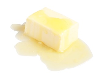 Photo of Piece of melting butter on white background