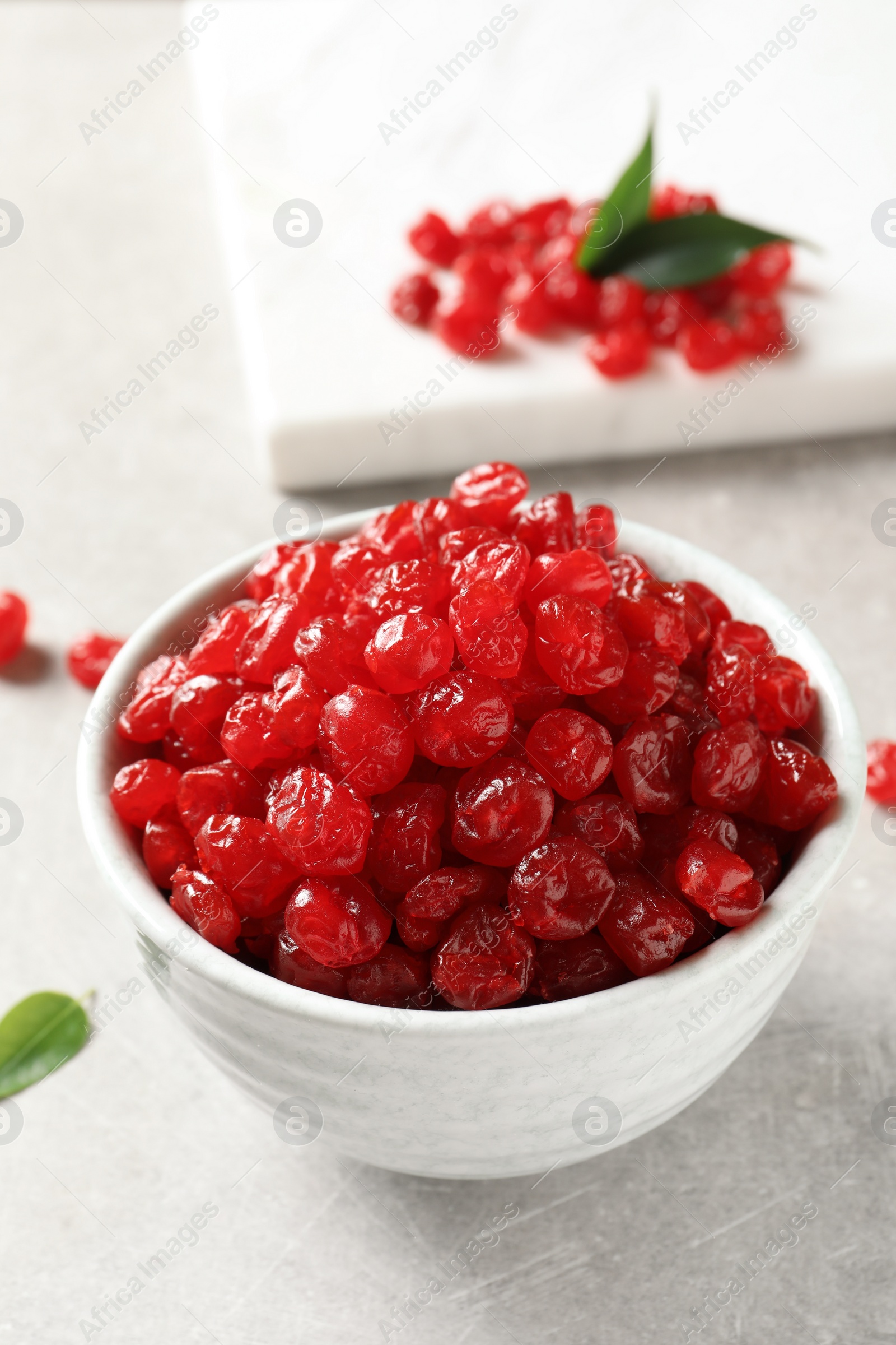 Photo of Bowl of sweet cherries on table. Dried fruit as healthy snack