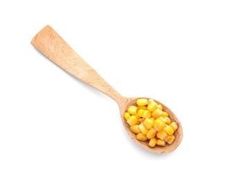 Photo of Wooden spoon with corn kernels on white background, top view