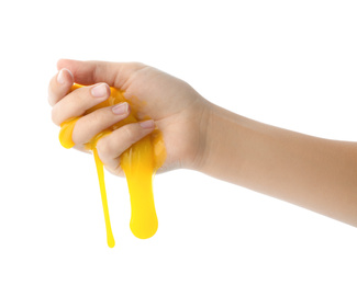 Photo of Woman playing with yellow slime isolated on white, closeup. Antistress toy