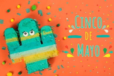 Cinco de Mayo festive poster. Bright funny pinata on orange background, flat lay